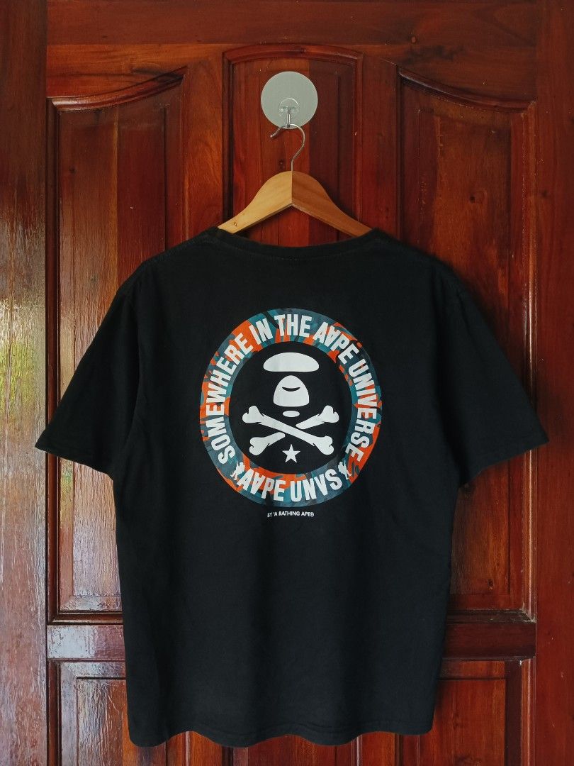 AAPE BY A BATHING APE T-shirt Black (Category: Blouses) located in Tagbilaran City. Submitted by kennlouise13 (Listing ID 1459979440, Image 1). Description: - Black AAPE BY A BATHING APE t-shirt - Features AAPE UNVS graphic on the front - Circular graphic on the back with text 'Somewhere in the Aape Universe' - Small logo detail on the sleeve - Perfect for casual everyday wear.