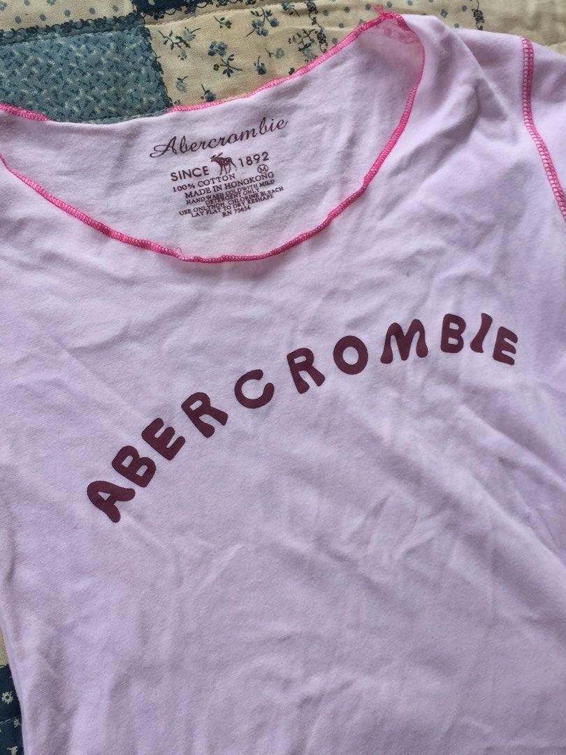 ABERCOMBIE pink shirt (Category: Shirts) located in Pili. Submitted by lagrisishi (Listing ID 1460000424, Image 3). Description: Dm got size and dimes.
