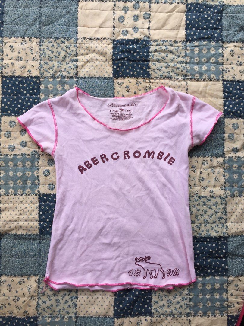 ABERCOMBIE pink shirt (Category: Shirts) located in Pili. Submitted by lagrisishi (Listing ID 1460000424, Image 1). Description: Dm got size and dimes.