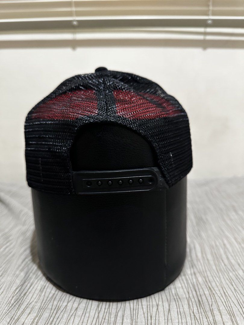 ACDC Let There Be Rock Trucker Cap (Category: Caps & Hats) located in Bacoor. Submitted by realbacktrack (Listing ID 1459905641, Image 3). Description: - Black trucker cap with ACDC 'Let There Be Rock' graphic - Features the iconic band logo and Angus Young playing guitar - Breathable mesh back for comfort - Adjustable snapback closure for a perfect fit - Size M - A must-have for any AC/DC enthusiast! *needs reshape *loose stitch on strap (see pi