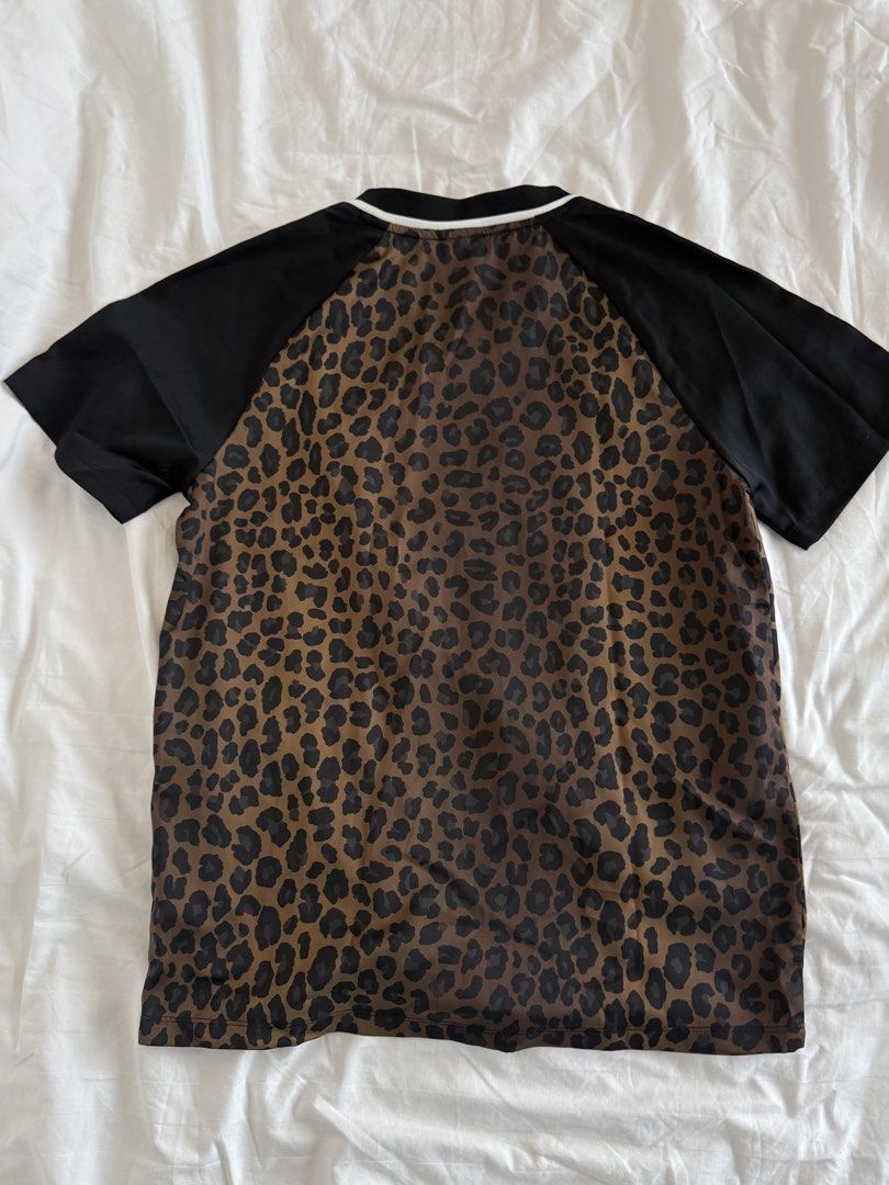 Adidas leopard jersey (Category: Shirts) located in Mandaluyong City. Submitted by outofstoragewtf (Listing ID 1459989836, Image 2). Description: - bought for 4,300 - worn once - size xs - 100% authentic - adidas leopard jersey.