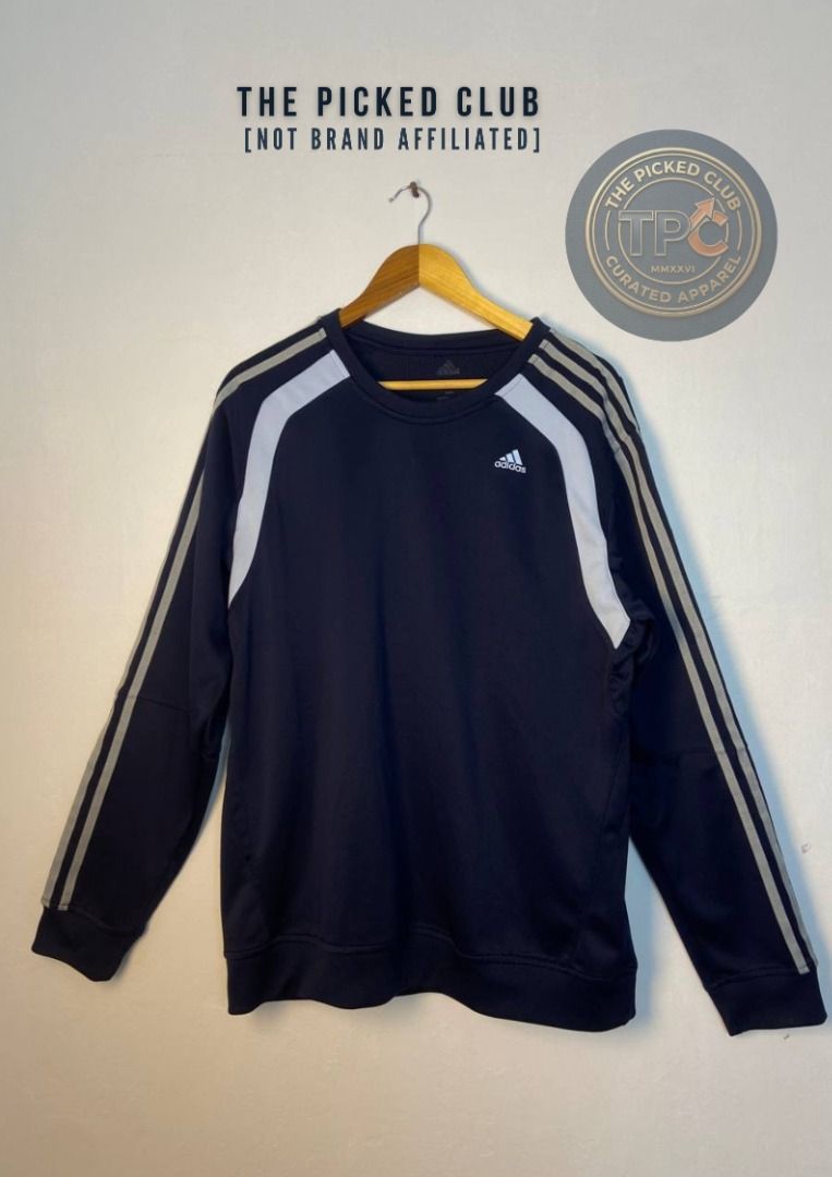 Adidas Long Sleeve Sweatshirt with 3 Stripes (Category: Longsleeves) located in Imus. Submitted by thepickedclub (Listing ID 1459972780, Image 1). Description: medium (21.5 x28) - Navy blue Adidas sweatshirt - Features classic three stripes on sleeves and shoulders - Crew neck, long sleeves - Ideal for casual wear or workouts - Comfortable and stylish design.