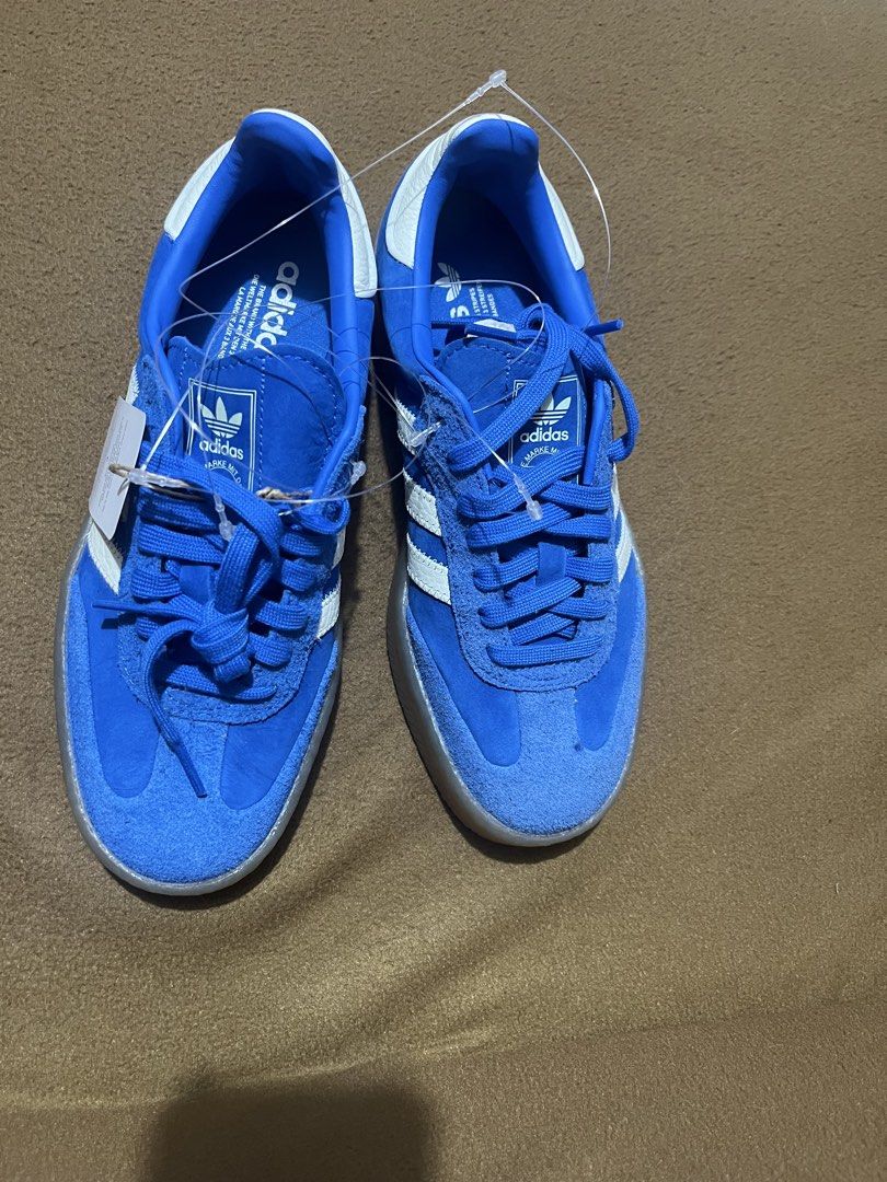 Adidas Samba W Blue White Sneakers (Category: Sneakers) located in Makati City. Submitted by joycesp (Listing ID 1459922280, Image 2). Description: - Authentic Adidas Samba W shoes - Vibrant blue color with classic white stripes - Features a durable gum sole - Size: 7.5 US Women's - Brand new, never worn - Original box and tags included.