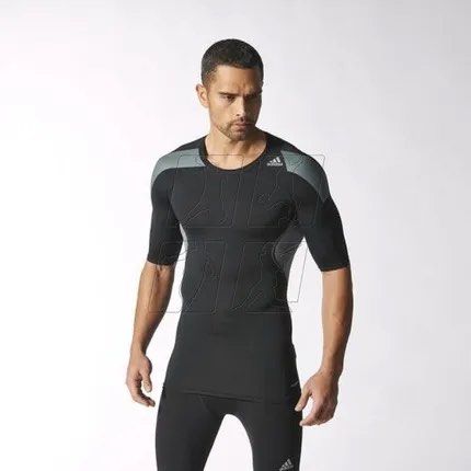 Adidas Techfit Compression Long Sleeve Top Climalite (Category: Activewear) located in Compostela. Submitted by anyastark (Listing ID 1460048453, Image 1). Description: - Black Adidas Techfit compression shirt - Long sleeves - Grey mesh panels on shoulders and sides - Climalite fabric for sweat management - Perfect for workouts or as a base layer - Techfit logo detail on the back - Width 18 - Length 27 - Stretchable .