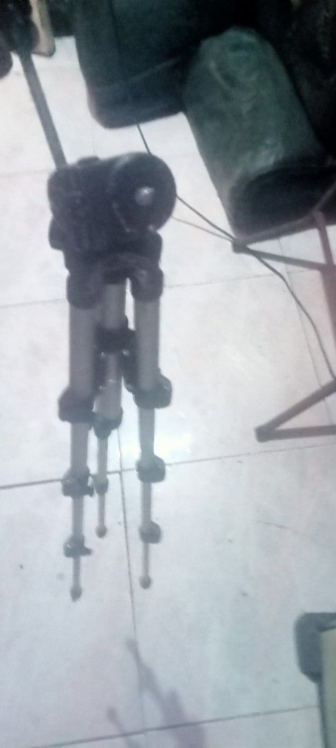 Adjustable Tripod for Camera and Phone (Category: Tripods & Monopods) located in Paranaque City. Submitted by dimaguilaa94969 (Listing ID 1460044521, Image 1). Description: - Sturdy and reliable tripod - Adjustable height with extendable legs - Securely holds cameras and smartphones p - Head tilts and pans for versatile angles - Ideal for photography and videography pm if int 09260966619.