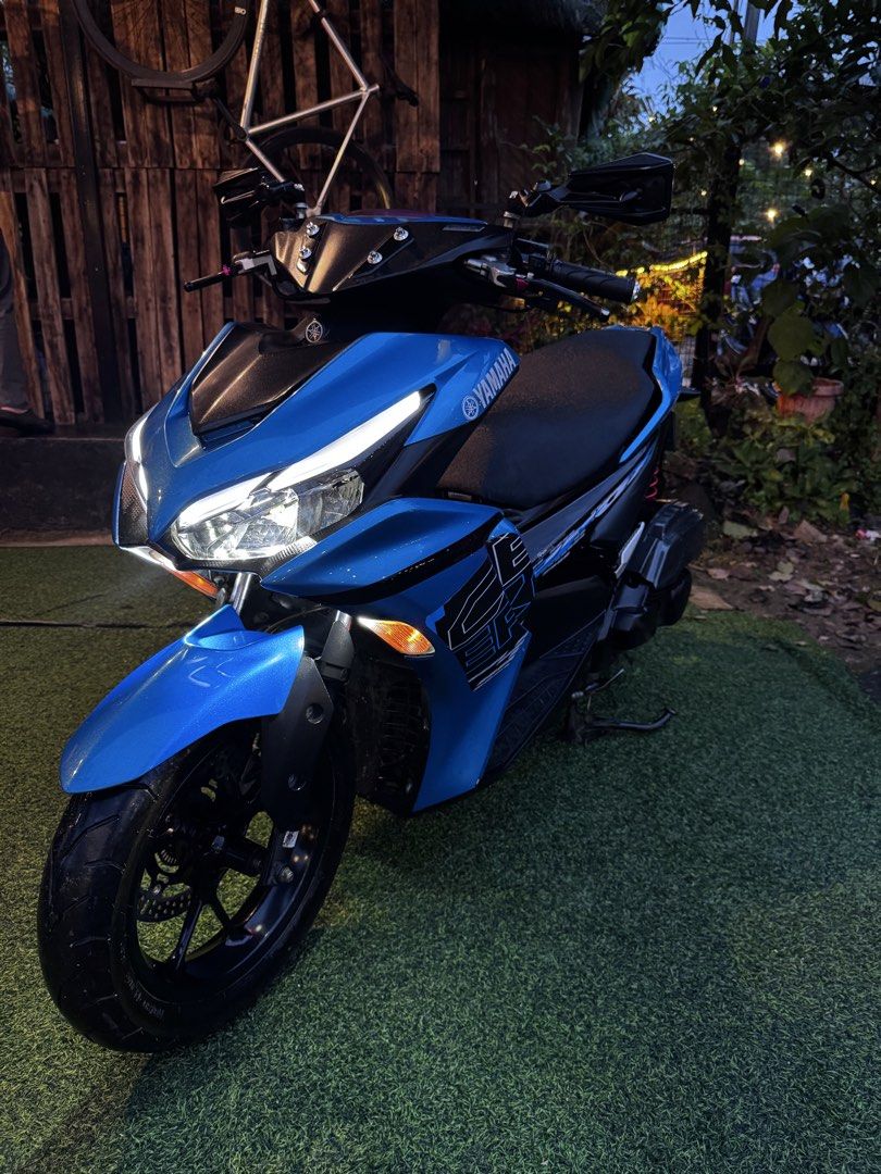 AEROX V2 2023 (Category: Motorbikes for Sale) located in Manila. Submitted by patboy06 (Listing ID 1460057603, Image 1). Description: Aerox v2 (non abs) 2023 model Registered til 2027 Color indicated (Blue) Complete orig docs Orig OR/CR Orig LTO Plate Ready to transfer ownership All stock engine All switch working 23k orig mileage (Unli scan) Rcb lever Mini driving light installed Big disc 260mm rcb shock Newly changed oil Newly changed gear oil 