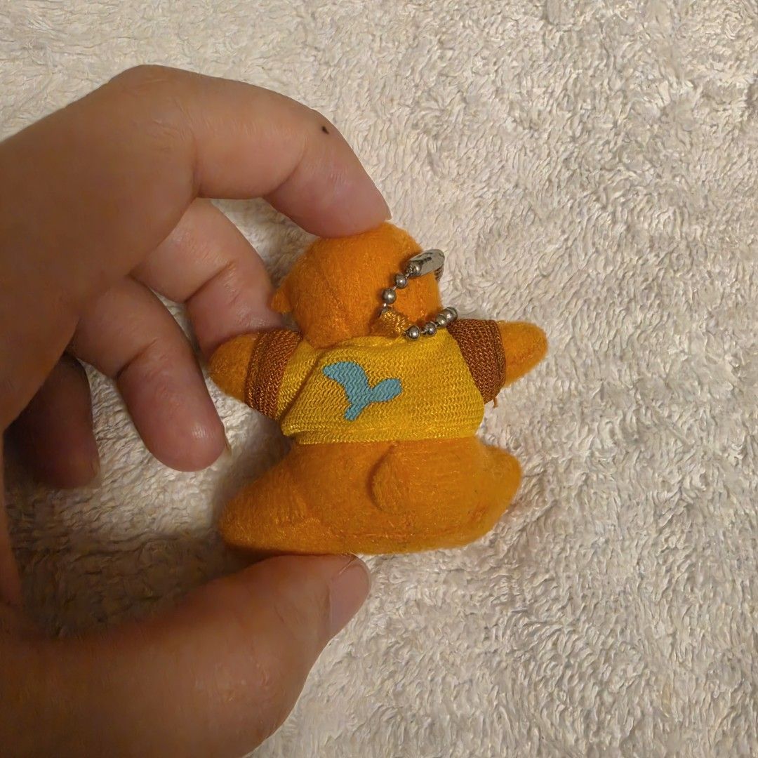 Afternoon Tea Teddy Bear Charm (Category: Plushies & Soft Toys) located in Pasig City. Submitted by aerasdrafts (Listing ID 1459993859, Image 2). Description: Orange plush bear mascot keychain from a promotional collaboration between Afternoon Tea and Sokenbicha (Coca-Cola Japan)..
