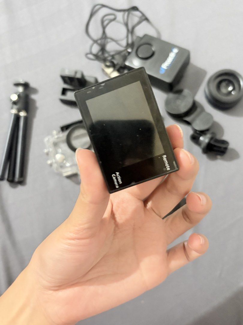 AKASO Brave 4 4K Action Camera with Accessories (Category: Cameras) located in Baguio. Submitted by cosmogyralfinds (Listing ID 1459957991, Image 3). Description: - AKASO Brave 4 Action Camera - Shoots in stunning 4K resolution - Includes waterproof case for underwater adventures - Comes with mini tripod, remote control, and various mounting accessories - Tested and confirmed to be in working condition - Ideal for capturing all your exciting esca