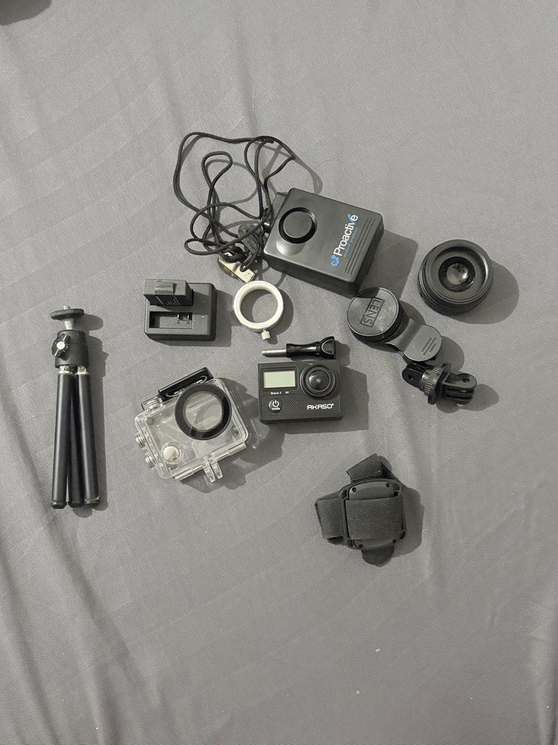 AKASO Brave 4 4K Action Camera with Accessories (Category: Cameras) located in Baguio. Submitted by cosmogyralfinds (Listing ID 1459957991, Image 1). Description: - AKASO Brave 4 Action Camera - Shoots in stunning 4K resolution - Includes waterproof case for underwater adventures - Comes with mini tripod, remote control, and various mounting accessories - Tested and confirmed to be in working condition - Ideal for capturing all your exciting esca