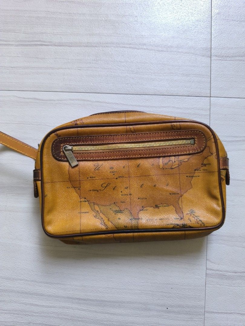 ALVIERO MARTINI Clutch/Toiletry Bag (Category: Purses & Pouches) located in Talisay. Submitted by jppppppppp (Listing ID 1460033491, Image 2). Description: Alviero Martini Clutch/Toiletry Actual Dimensions W 10.5 L 6.3 Thickness 2.5 In Very Good Condition Minor peeling inside. 1️⃣4️⃣9️⃣0️⃣+SF 09472849954.