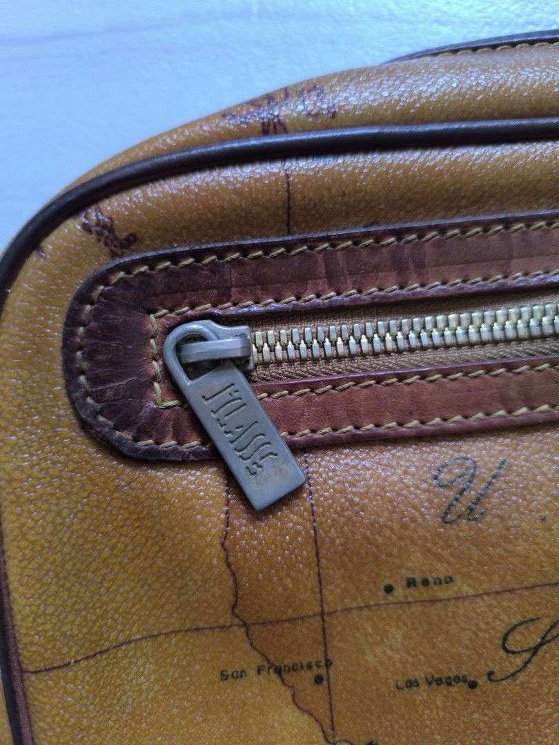 ALVIERO MARTINI Clutch/Toiletry Bag (Category: Purses & Pouches) located in Talisay. Submitted by jppppppppp (Listing ID 1460033491, Image 3). Description: Alviero Martini Clutch/Toiletry Actual Dimensions W 10.5 L 6.3 Thickness 2.5 In Very Good Condition Minor peeling inside. 1️⃣4️⃣9️⃣0️⃣+SF 09472849954.