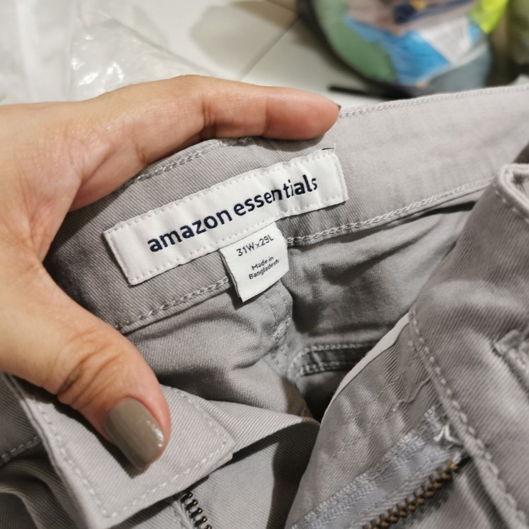 Amazon Essentials Men's Slim Fit Stretch Twill Pants Light Grey (Category: Trousers) located in Dasmarinas. Submitted by aprilstore2025 (Listing ID 1459941628, Image 1). Description: - Brand: Amazon Essentials - Color: Light Grey - Fit: Slim Fit - Size: 31W x 29L - Material: Stretch Twill Fabric - Origin: Made in Bangladesh - Features: Comfortable, great for everyday wear - Condition: Please check photos for details.