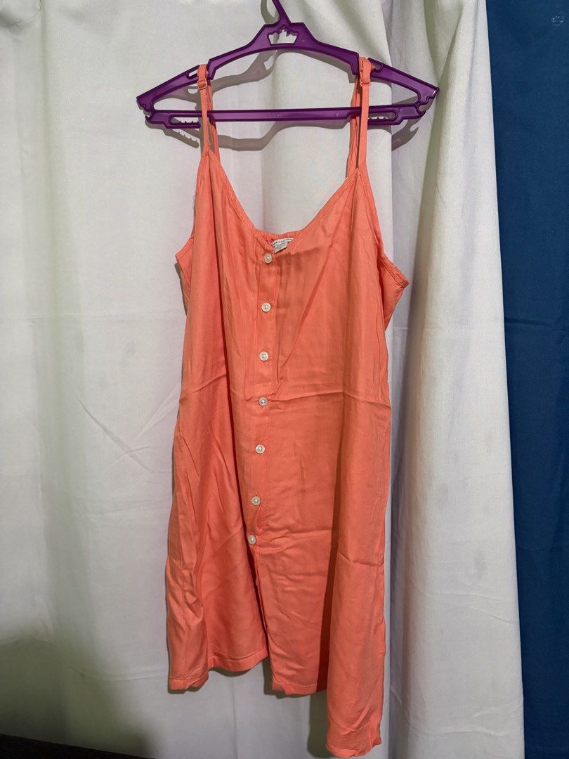 American Eagle Orange Dress (Category: Dresses) located in Manila. Submitted by prelovedbtsmerch_ph (Listing ID 1459943713, Image 1). Description: - Size: Medium - Button front detail - Ties at the back for adjustable fit.