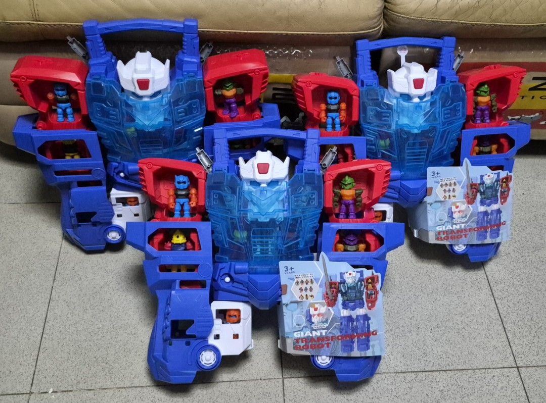 ANKO Giant Transforming Robot Toy with 10 Mini Figures (Category: Action & Battle Toys) located in Tagaytay City. Submitted by gracey332 (Listing ID 1459976578, Image 2). Description: - Large transforming robot toy - Includes several mini figures that fit inside - Features blue and red parts with clear blue accents - Two robots are still in original packaging (sealed) - Ideal for kids who love robots and action figures - Encourages imaginative an