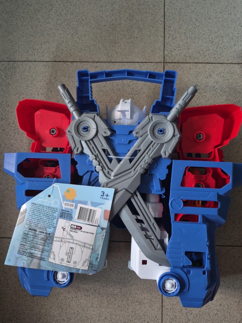 ANKO Giant Transforming Robot Toy with 10 Mini Figures (Category: Action & Battle Toys) located in Tagaytay City. Submitted by gracey332 (Listing ID 1459976578, Image 3). Description: - Large transforming robot toy - Includes several mini figures that fit inside - Features blue and red parts with clear blue accents - Two robots are still in original packaging (sealed) - Ideal for kids who love robots and action figures - Encourages imaginative an