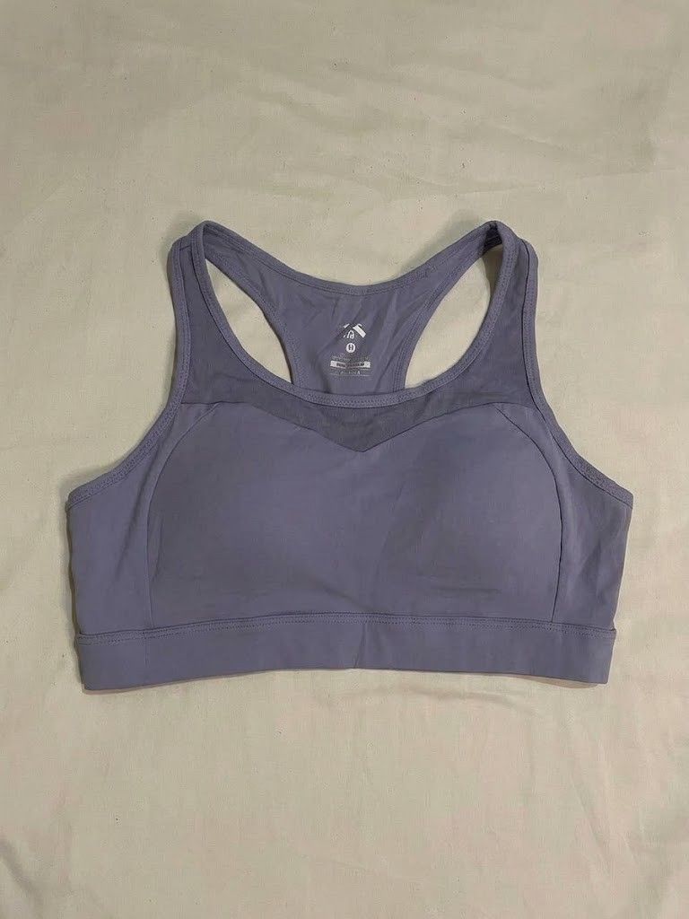 ANTA Lavender Sports Bra (Category: Activewear) located in Binan City. Submitted by declutterbyjwy (Listing ID 1459987273, Image 1). Description: bust: 34-36" | length: 11" - size m but it runs small; it fits an xs-semi m - good as new, never used & no flaws - mesh panel at neckline, racerback style.