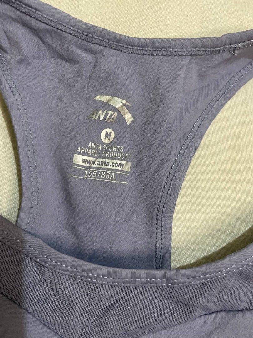 ANTA Lavender Sports Bra (Category: Activewear) located in Binan City. Submitted by declutterbyjwy (Listing ID 1459987273, Image 3). Description: bust: 34-36" | length: 11" - size m but it runs small; it fits an xs-semi m - good as new, never used & no flaws - mesh panel at neckline, racerback style.