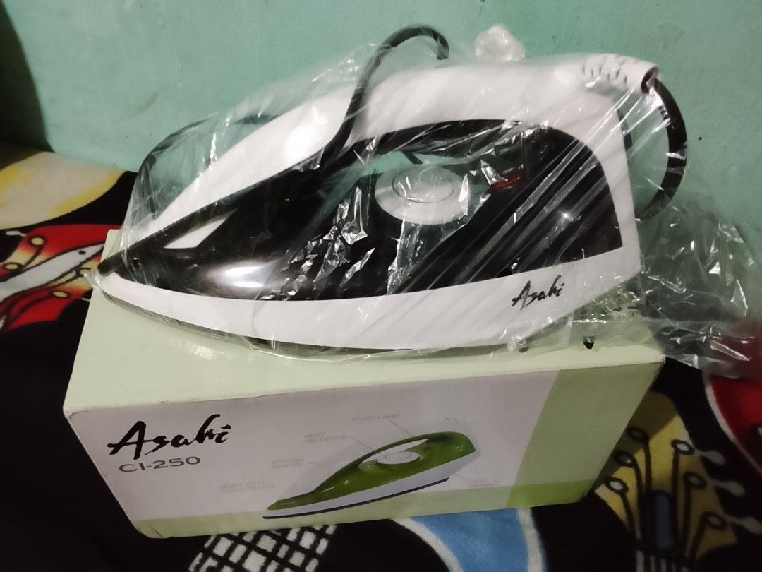 Asahi steam iron 950W (230v) (Category: Irons & Steamers) located in Manila. Submitted by newage.vintage (Listing ID 1460015194, Image 1). Description: Asahi steam iron good condition no issue .