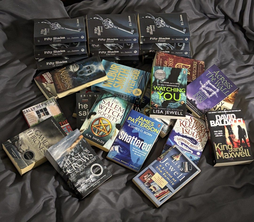 Assorted Fiction Books - Various Authors and Genres (Category: Storybooks) located in Baguio. Submitted by kewlfinds (Listing ID 1460000721, Image 1). Description: - Fiction book collection for sale - Includes popular series like Fifty Shades and Game of Thrones - Features authors Wilbur Smith, Lisa Jewell, and David Baldacci - Diverse selection for various reading tastes - Some books are part of ongoing series - Excellent value, grab a bargain!.