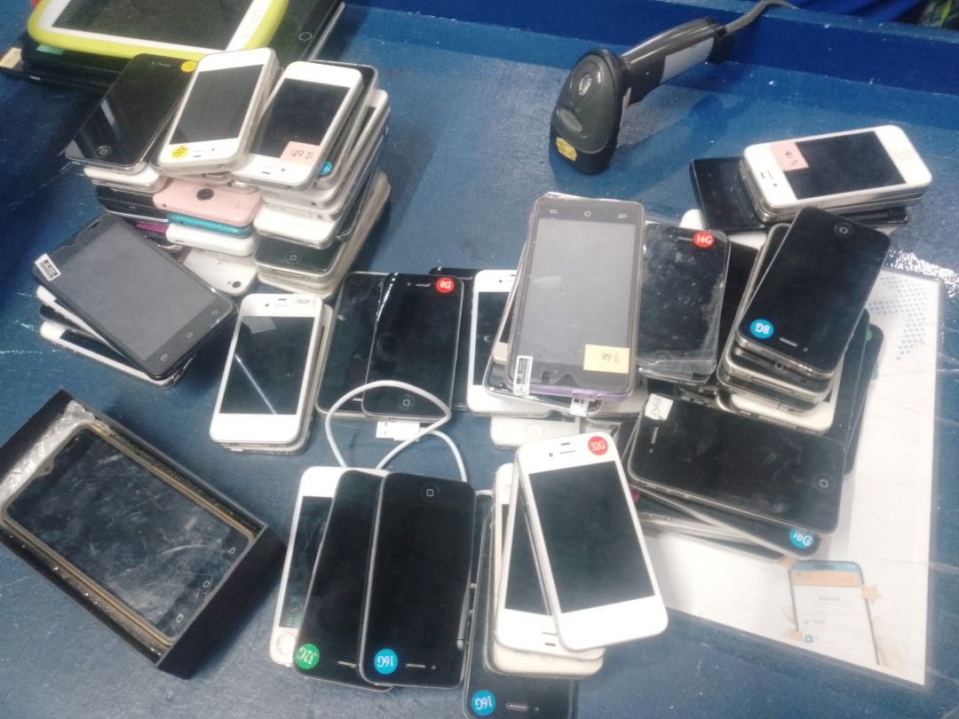 Assorted iPhones and Android Phones - Bulk Lot (Category: Android Others) located in Manila. Submitted by maryjane09. (Listing ID 1459950034, Image 1). Description: - Bundle of assorted smartphones (iPhones and Androids) - Ideal for parts or repair - Includes various storage sizes: 16G, 32G, 8G, and '99b' - Sold as is - Please check photos for individual phone conditions.