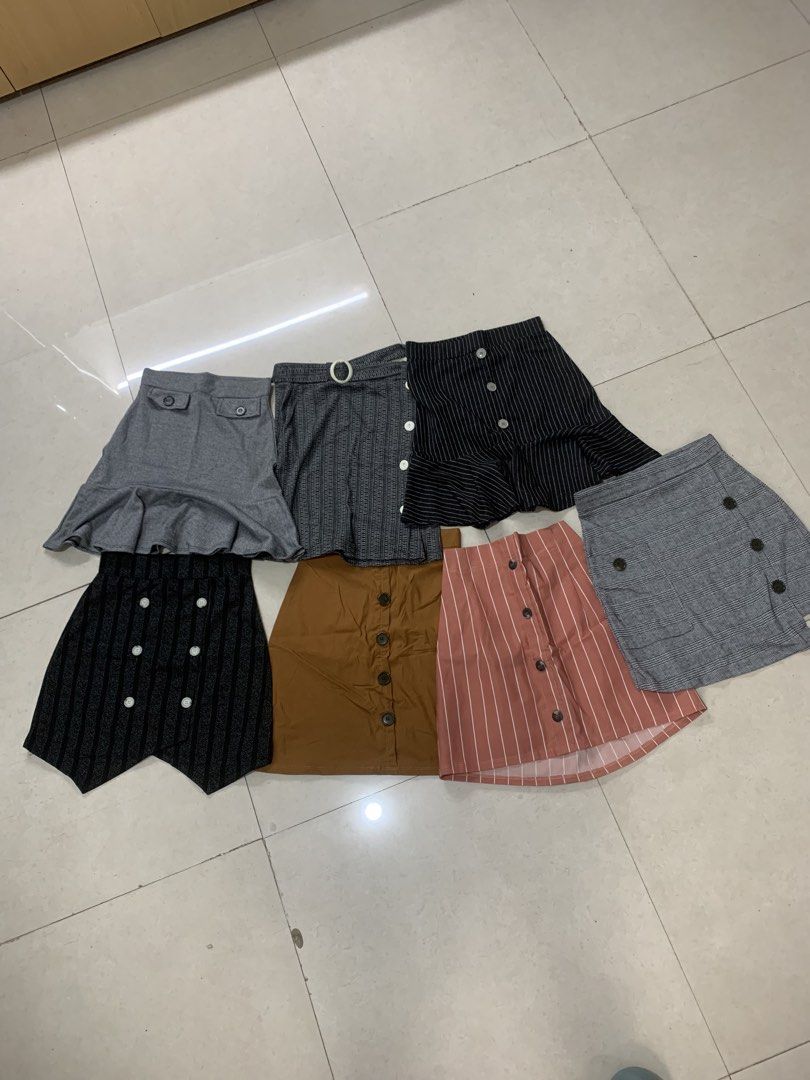 Assorted Skirts - Various Styles and Colors (Category: Skirts) located in Manila. Submitted by bobby.bobby2 (Listing ID 1459919530, Image 1). Description: - Bundle of skirts ( 7 ) featuring pleated, A-line, and ruffled styles. - Includes various patterns like pinstripes and others - All skirts are knee-length or mini. - size 24 to 26 elastic waistband - pick up or lalamove shldered by buyer.