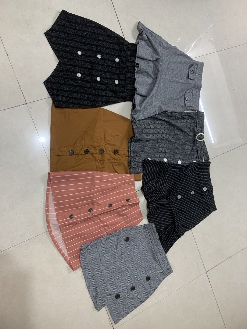 Assorted Skirts - Various Styles and Colors (Category: Skirts) located in Manila. Submitted by bobby.bobby2 (Listing ID 1459919530, Image 2). Description: - Bundle of skirts ( 7 ) featuring pleated, A-line, and ruffled styles. - Includes various patterns like pinstripes and others - All skirts are knee-length or mini. - size 24 to 26 elastic waistband - pick up or lalamove shldered by buyer.