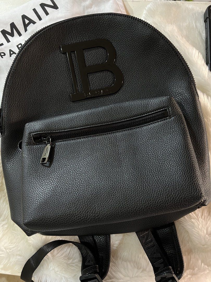 Authentic Balmain Black Leather Backpack w/ pricetag (Category: Luxury Bags & Wallets) located in Las Pinas. Submitted by iceedevclutter (Listing ID 1460036795, Image 1). Description: - Authentic Balmain black leather backpack - Features iconic B logo on the front - Convenient zippered front pocket - sourced from UAE Free delivery!.