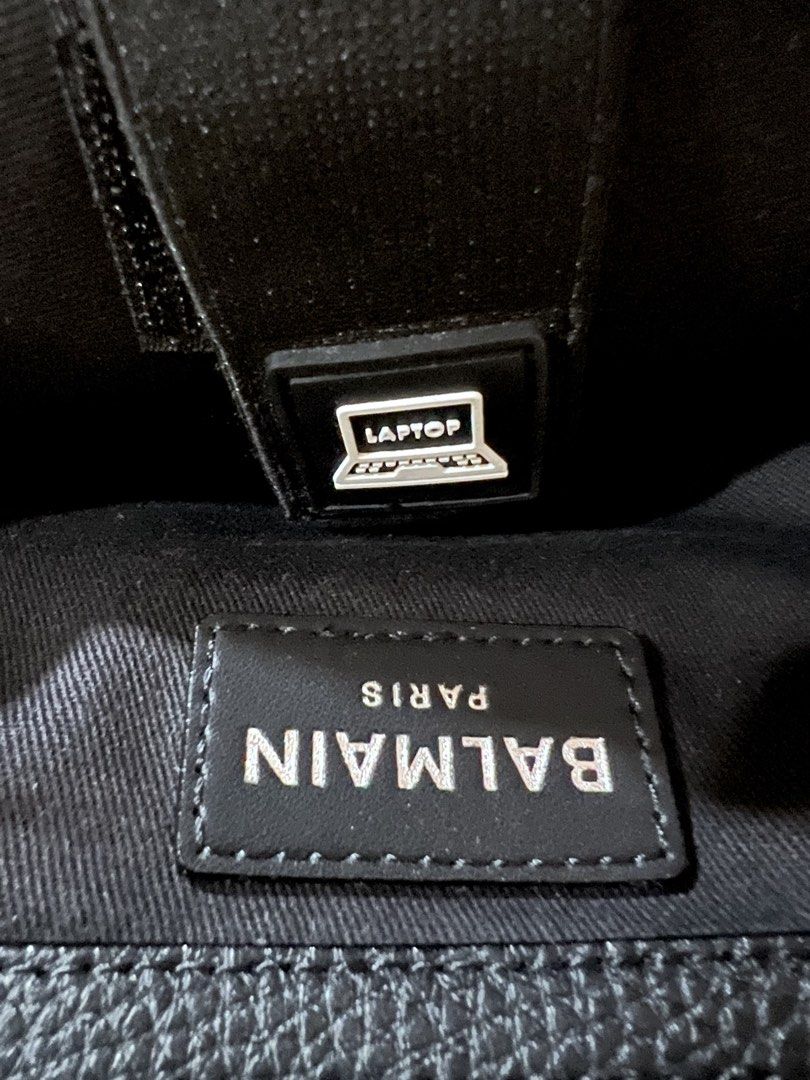 Authentic Balmain Black Leather Backpack w/ pricetag (Category: Luxury Bags & Wallets) located in Las Pinas. Submitted by iceedevclutter (Listing ID 1460036795, Image 3). Description: - Authentic Balmain black leather backpack - Features iconic B logo on the front - Convenient zippered front pocket - sourced from UAE Free delivery!.