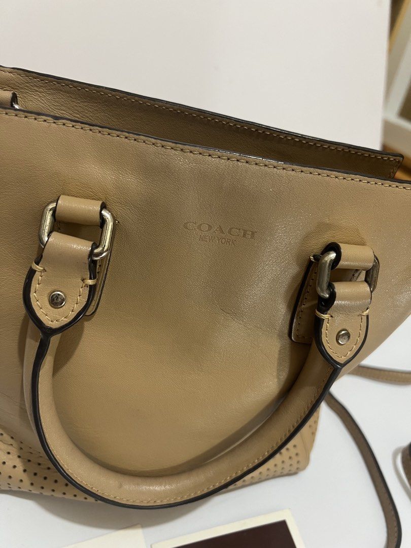 AUTHENTIC COACH LEGACY MINI TANNER PERFORATED (Category: Luxury Bags & Wallets) located in Calamba. Submitted by amrntoaubrey (Listing ID 1460100674, Image 3). Description: still negotiable 🫶🏻 Preloved Coach Mini Tanner bag 🤎 Used and has signs of wear from regular use, but still functional and perfect for everyday use. 📌 Condition: Preloved / well-used 📌 Selling as-is, please manage expectations regarding the condition. RFS: Decluttering / 