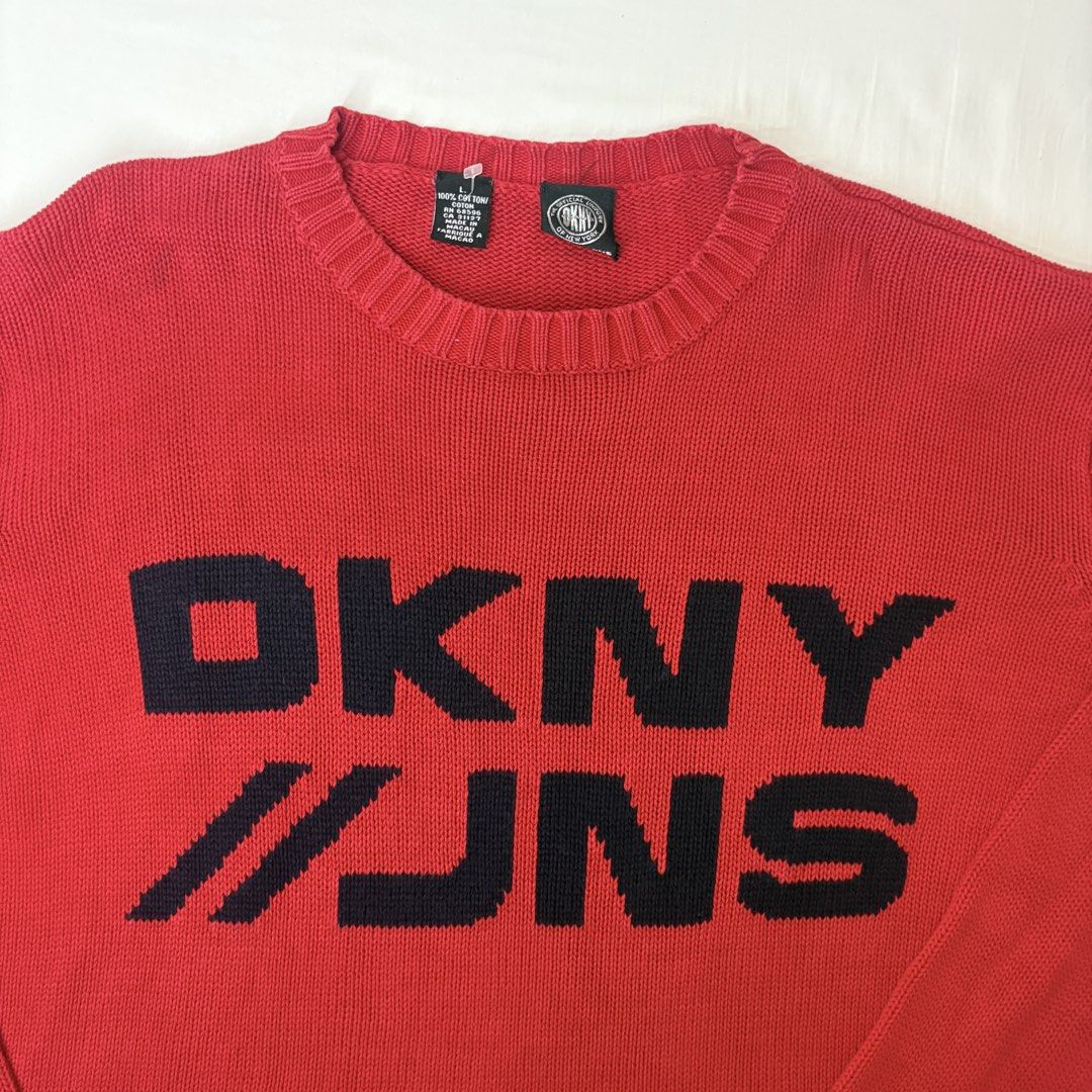 Authentic DKNY Jeans Red Cotton Sweater Size L (Category: Coats, Jackets and Outerwear) located in Angeles City. Submitted by muse_archive (Listing ID 1459964787, Image 3). Description: - Authentic red DKNY Jeans sweater - Size: L - Material: 100% Cotton ✨ - Origin: Made in Macau .