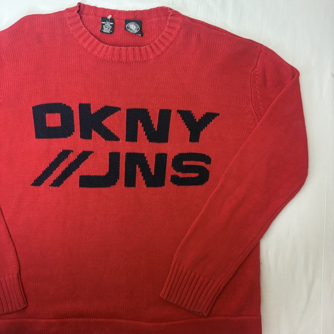 Authentic DKNY Jeans Red Cotton Sweater Size L (Category: Coats, Jackets and Outerwear) located in Angeles City. Submitted by muse_archive (Listing ID 1459964787, Image 2). Description: - Authentic red DKNY Jeans sweater - Size: L - Material: 100% Cotton ✨ - Origin: Made in Macau .