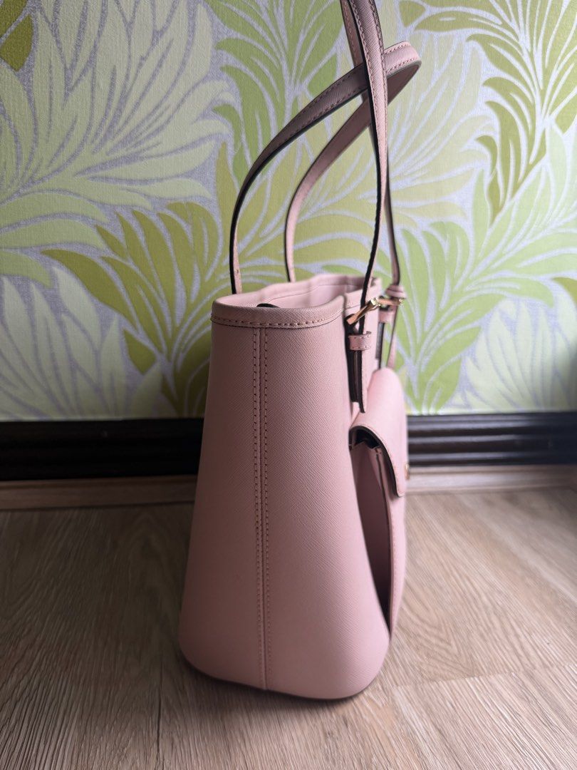 Authentic Michael Kors Leather Tote (Category: Tote Bags) located in Manila. Submitted by bagloverscloset (Listing ID 1459977750, Image 3). Description: Bargain Sale!!! Original MK tote for only P2,500!!! Authentic Michael Kors Jet Set Tote Item Code: 38H8GTTT6L Color: Blossom Material: Saffiano Leather Size: length 9”, base width 10”, opening width 13”, base 5.5” Bought in the U.S. Tag intact, never used. With flaws - scratches/chafing, discolor