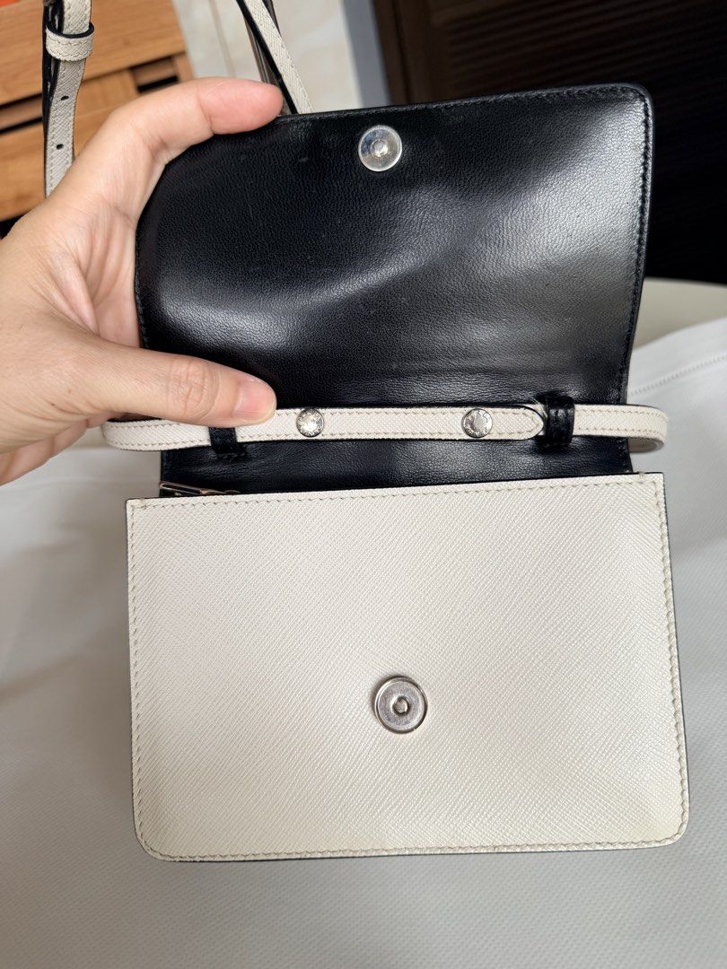 Authentic prada saffiano wallet on strap (Category: Luxury Bags & Wallets) located in Caloocan City. Submitted by alavishglam (Listing ID 1459944279, Image 2). Description: .