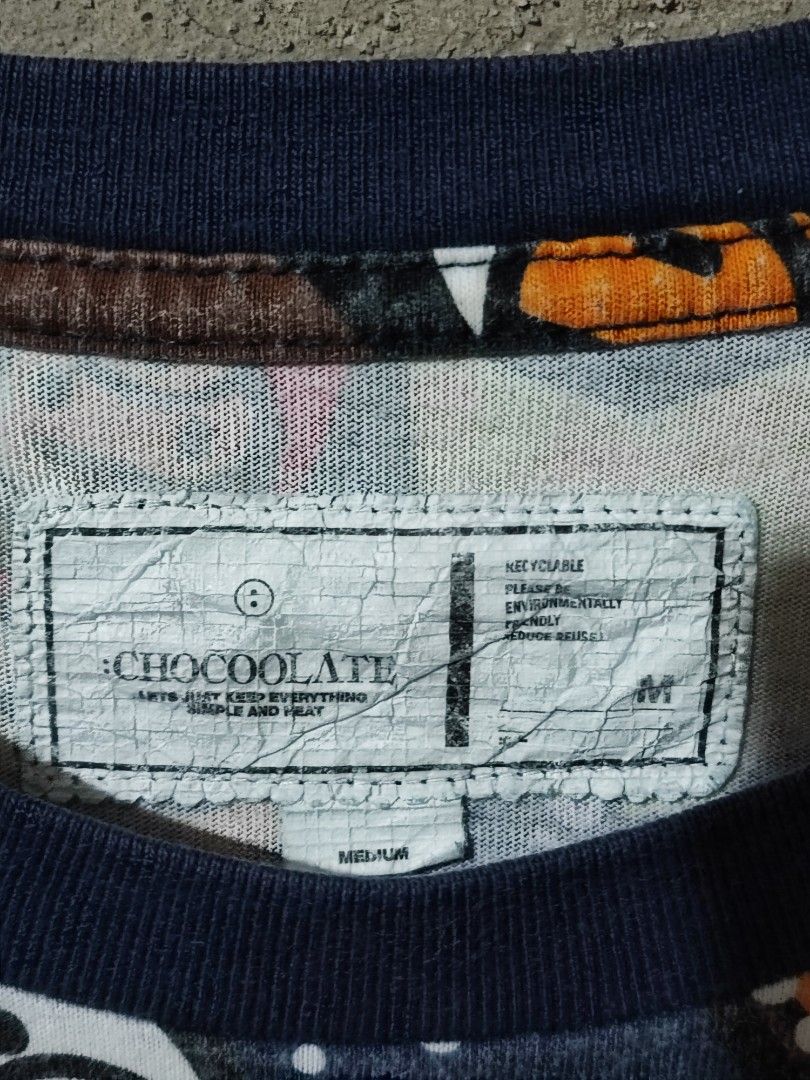 BABY MILO X CHOCOLATE "COSMOS" SPACE TEE (Category: Tshirts & Polo Shirts ) located in Iloilo. Submitted by gooddimes (Listing ID 1460094793, Image 3). Description: Baby Milo x Chocolate 'Cosmos' Space Tee Authentic All-Over Print Size on tag: Medium Dimes: 20Wx25L Issue/s: Lints Color rate: 9/10 Good condition ₱750 Reminders: - All items are thrifted, please manage your expectations - Color may vary due to lighting - Please wash before using the