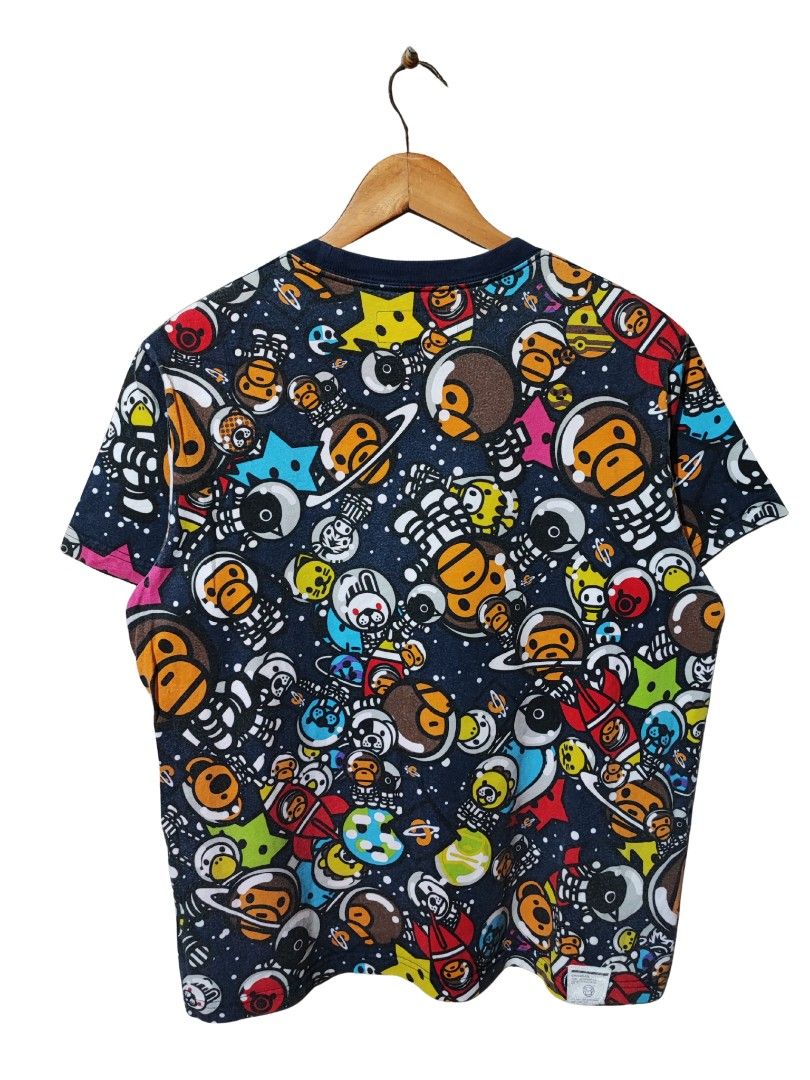 BABY MILO X CHOCOLATE "COSMOS" SPACE TEE (Category: Tshirts & Polo Shirts ) located in Iloilo. Submitted by gooddimes (Listing ID 1460094793, Image 2). Description: Baby Milo x Chocolate 'Cosmos' Space Tee Authentic All-Over Print Size on tag: Medium Dimes: 20Wx25L Issue/s: Lints Color rate: 9/10 Good condition ₱750 Reminders: - All items are thrifted, please manage your expectations - Color may vary due to lighting - Please wash before using the
