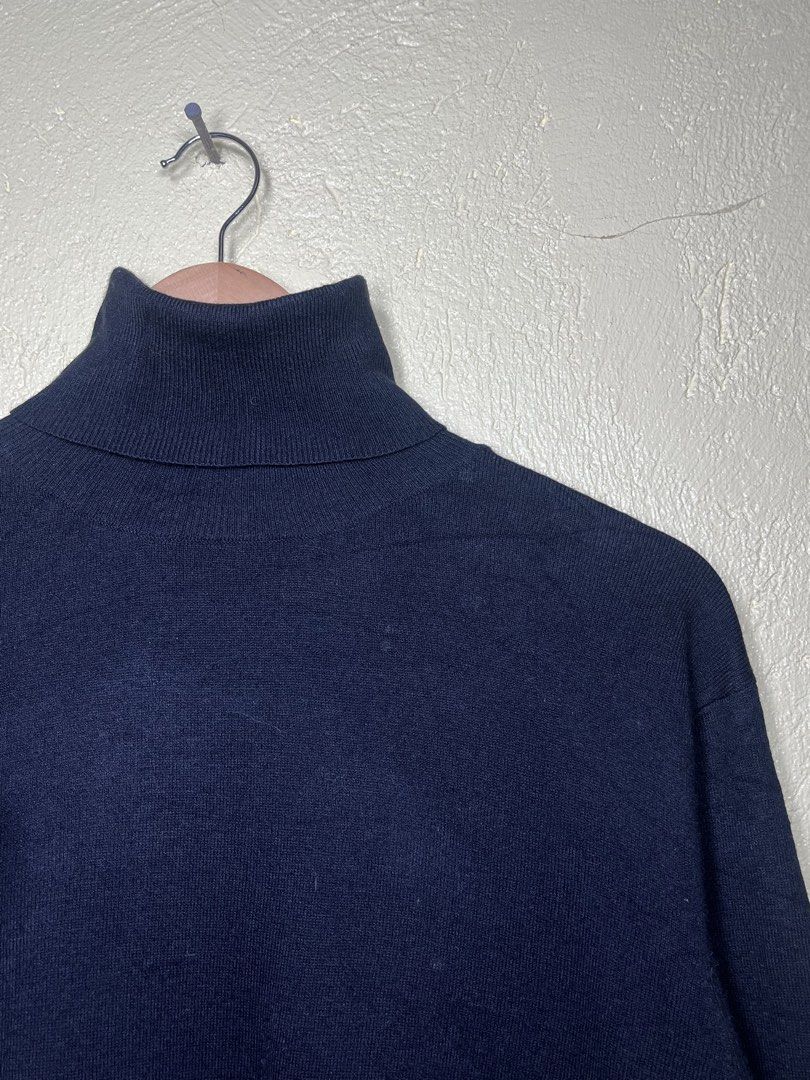 Balenciaga Black Turtleneck Top (Category: Sleeveless) located in San Isidro, Leyte. Submitted by tigerxdx3580077 (Listing ID 1459904915, Image 2). Description: - Balenciaga black turtleneck top - Made in Italy - Ideal for layering - Care instructions available on label (multiple languages).