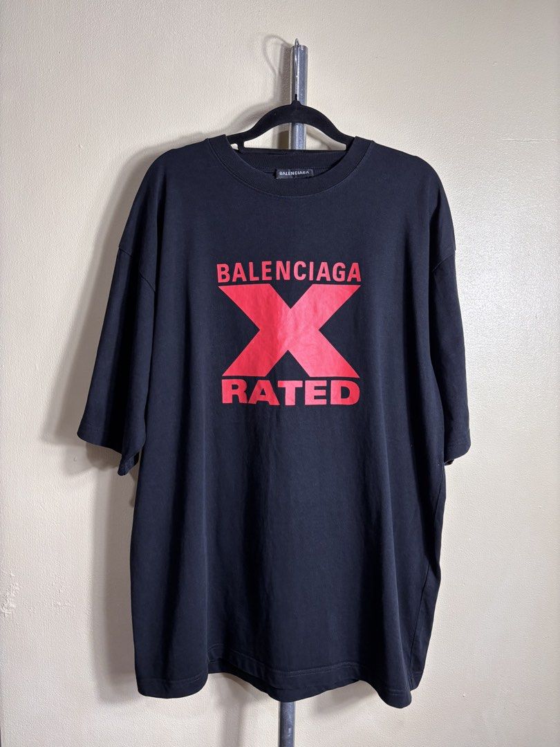 Balenciaga X Rated Shirt (Category: Formal Shirts) located in Manila. Submitted by earlylifecrisis (Listing ID 1459901116, Image 1). Description: Sz Medium Condition 9/10 Measure it by inch Width: 23.5 Length: 30 Shoulder: 22 Sleeve: 10 Bust: 21 Hem: 24 •Refund / Returns not allowed allowed •Please do check the dimensions size on labels sometimes are not accurate on the sizing •Ask me before purchasing.
