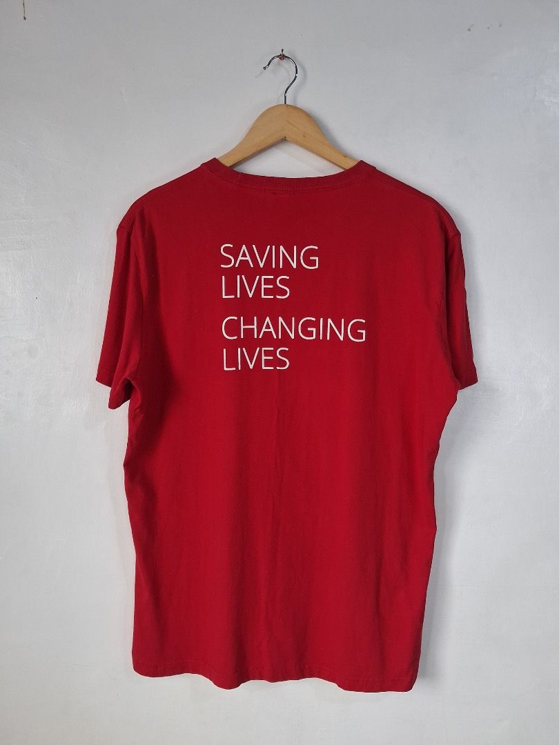 Balenciaga X World Food Programme Red Tee (Category: Luxury Apparel) located in Makati City. Submitted by seller_102 (Listing ID 1459917415, Image 2). Description: Brand: Balenciaga X WFP Dimes: 22.5in x 28.5in Issue: None Color Rate: 9.5/10 Condition: Excellent.