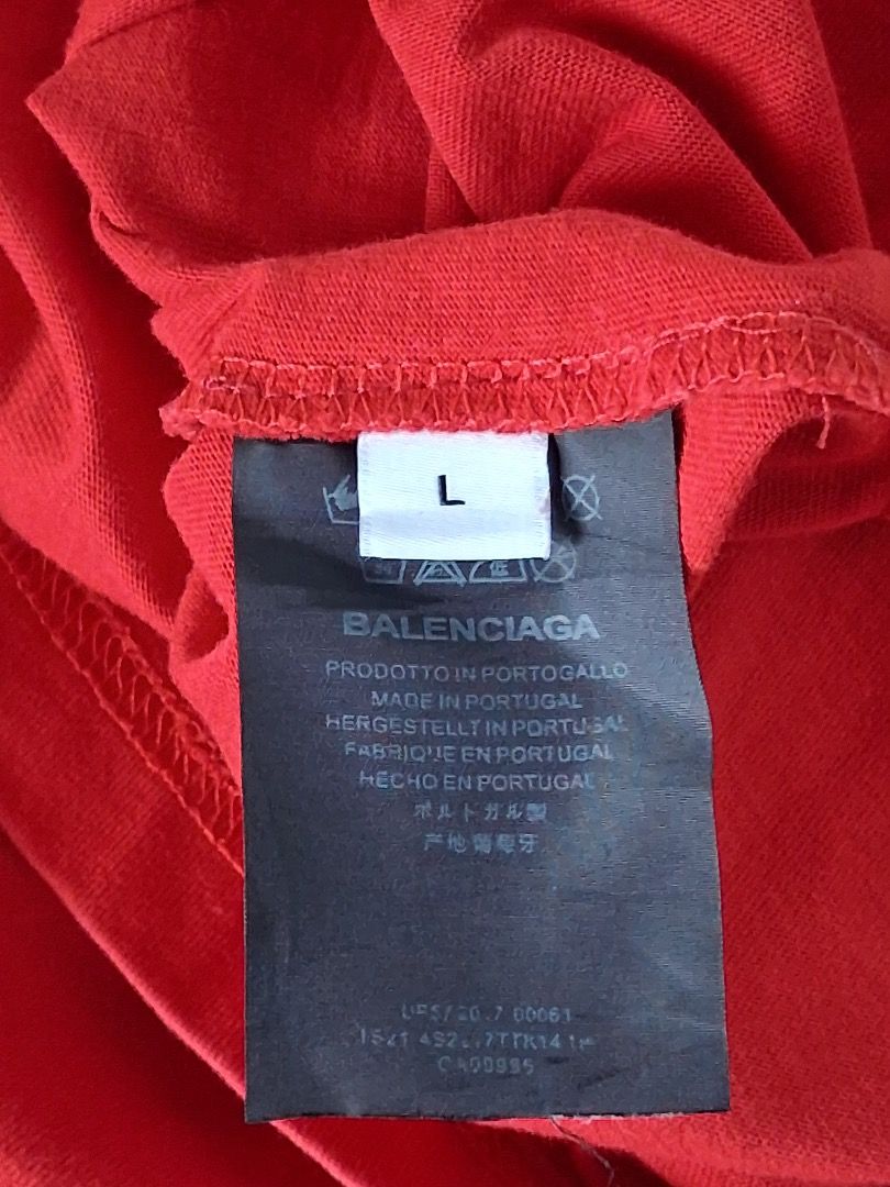Balenciaga X World Food Programme Red Tee (Category: Luxury Apparel) located in Makati City. Submitted by seller_102 (Listing ID 1459917415, Image 3). Description: Brand: Balenciaga X WFP Dimes: 22.5in x 28.5in Issue: None Color Rate: 9.5/10 Condition: Excellent.