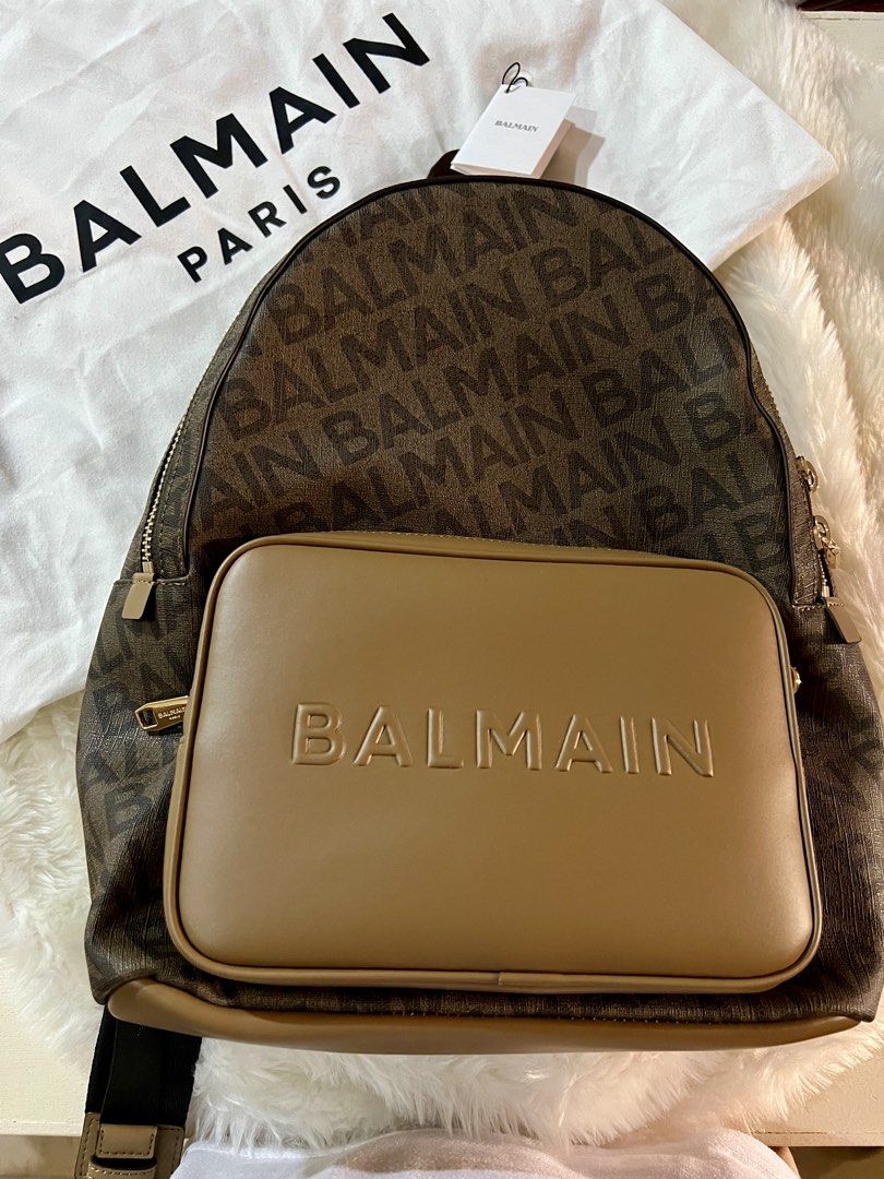 Authentic Balmain Monogram Backpack with Front Pouch, with pricetag (Category: Luxury Bags & Wallets) located in Las Pinas. Submitted by iceedevclutter (Listing ID 1460035430, Image 1). Description: - Authentic Balmain backpack in signature monogram print. - Features a detachable Balmain-branded front pouch. - sourced from UAE Free delivery!.