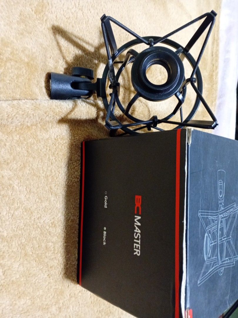 BC MASTER 21mm Microphone Shock Mount (Category: Microphones) located in Las Pinas. Submitted by jaziyah4 (Listing ID 1459963104, Image 3). Description: - BC MASTER Black Microphone Shock Mount - Fits microphones with a 21mm diameter - Effectively reduces vibrations and handling noise - Improves audio quality for recording and streaming - Comes with an adapter - Includes original packaging - Ready for immediate shipping BC Master Universal Microp