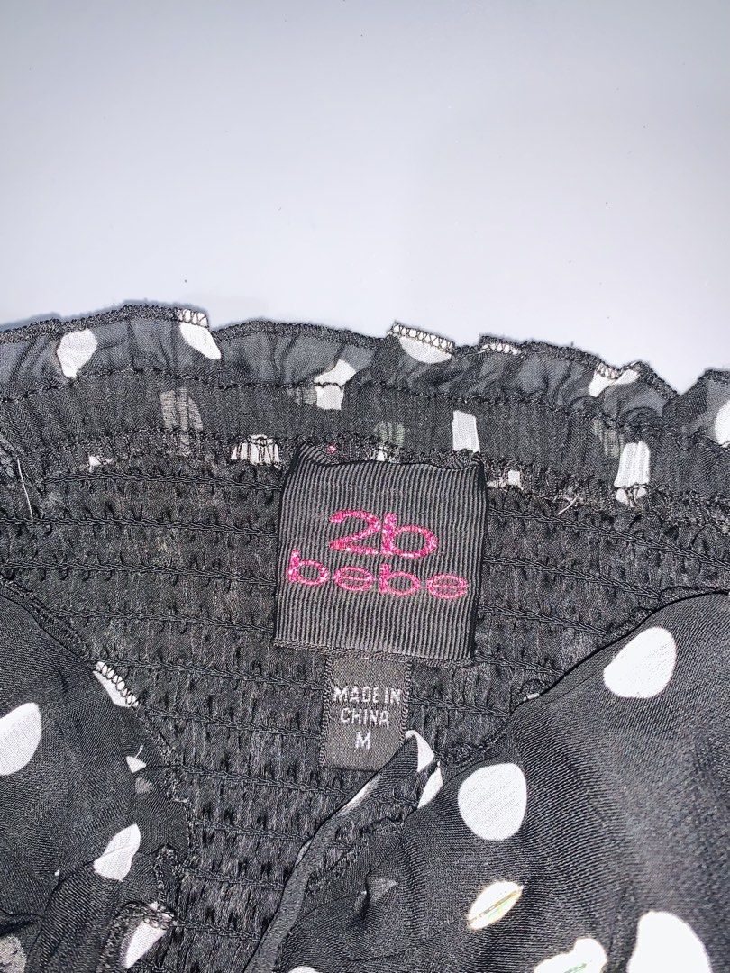 Bebe Black Polka Dot Strapless Mini Dress Size M (Category: Dresses) located in Dagupan City. Submitted by sj_styles0910. (Listing ID 1460096277, Image 2). Description: - Cute black strapless mini dress - White polka dot pattern - Smocked bust for a comfortable and secure fit - Flirty ruffled hemline - Ideal for night outs or parties - Versatile styling with heels or sandals.