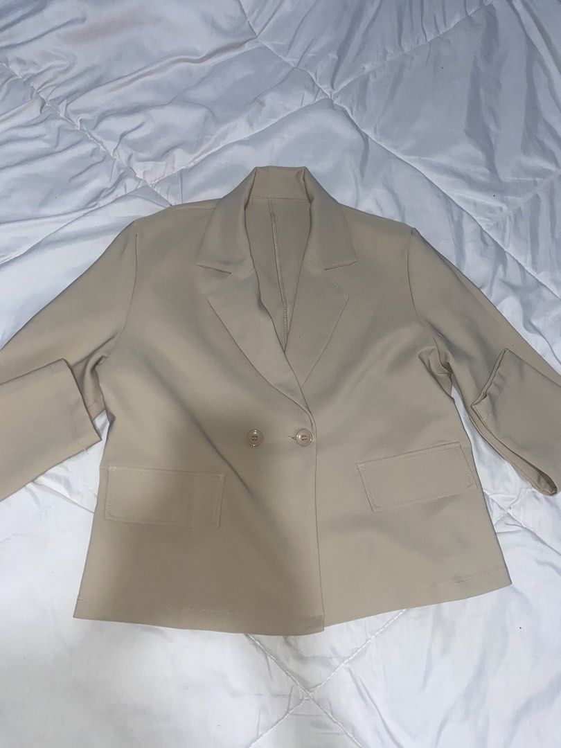 Beige Blazer and Pants Set (Category: Coats, Jackets and Outerwear) located in San Pedro. Submitted by declutter_mae (Listing ID 1459943473, Image 2). Description: - Beige suit set - Double-breasted blazer with 2 buttons and 2 front pockets - Pants with button closure and elastic waistband at the back - Perfect for work or a smart casual look - Comfortable fit.