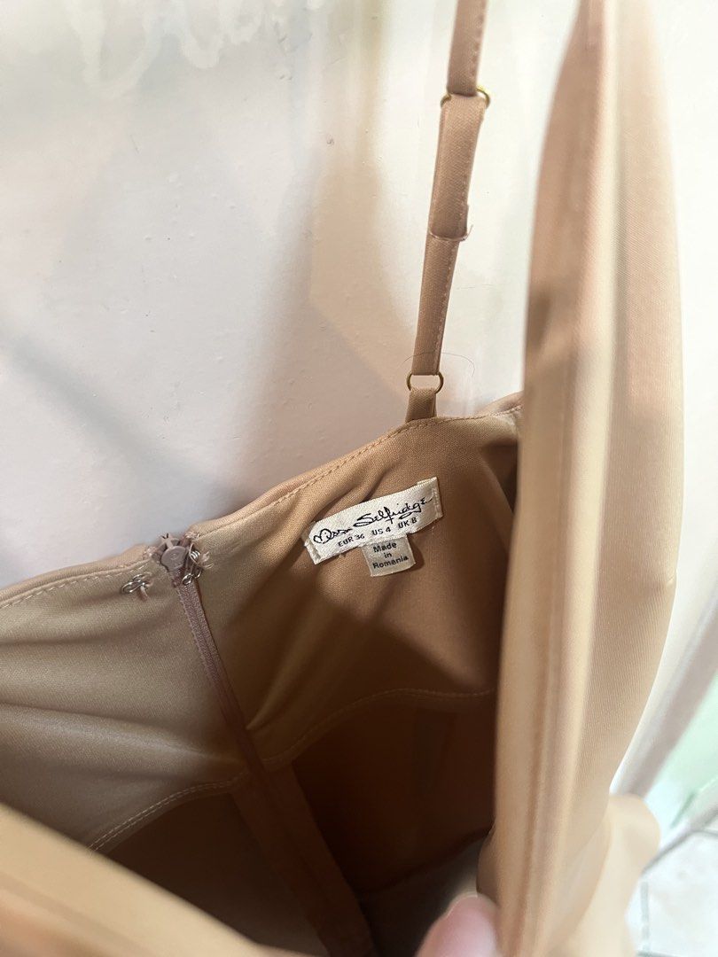 Beige Short Dress (Category: Dresses) located in Quezon City. Submitted by closetofk (Listing ID 1460003708, Image 3). Description: - used only 2-3 times - still like new; no flaws - v neck with asymmetrical hem & adjustable spaghetti straps - length falls above my knees (im 5’4) -.