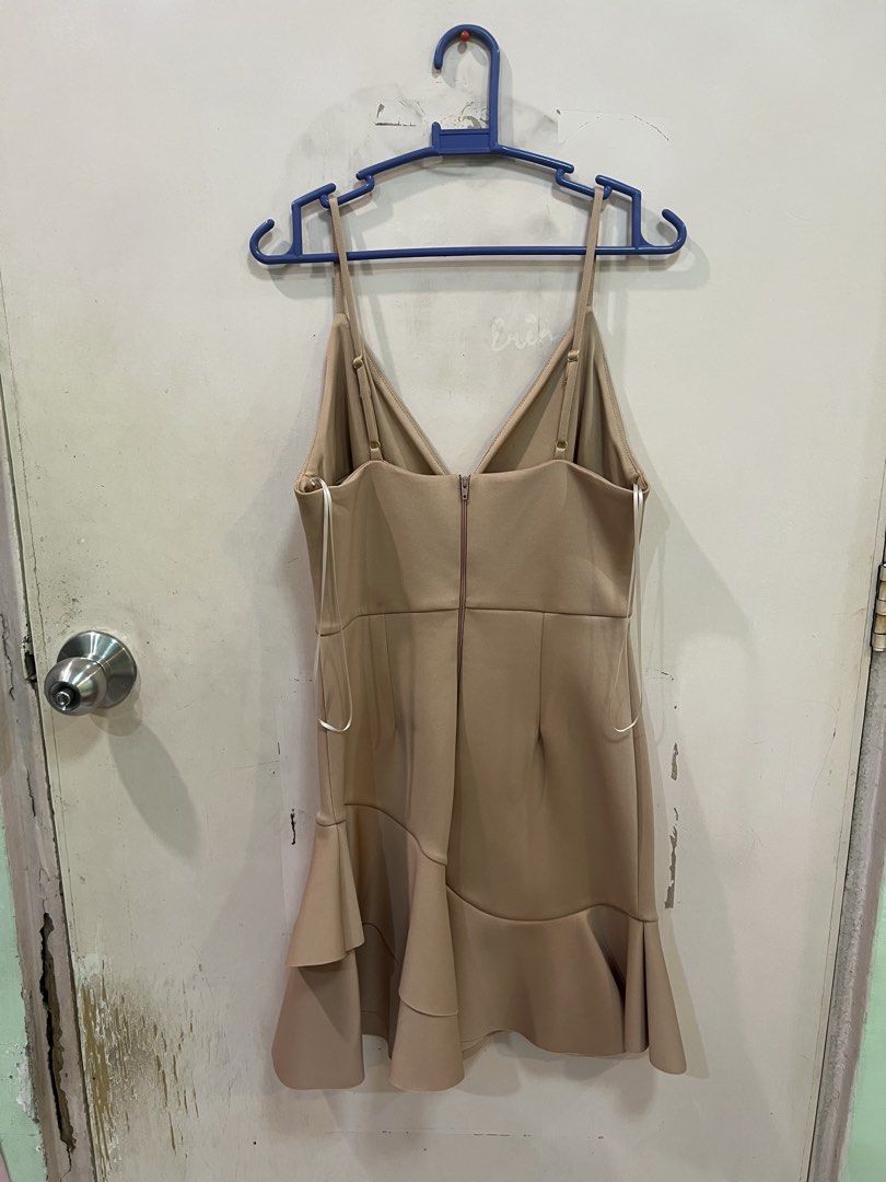 Beige Short Dress (Category: Dresses) located in Quezon City. Submitted by closetofk (Listing ID 1460003708, Image 2). Description: - used only 2-3 times - still like new; no flaws - v neck with asymmetrical hem & adjustable spaghetti straps - length falls above my knees (im 5’4) -.