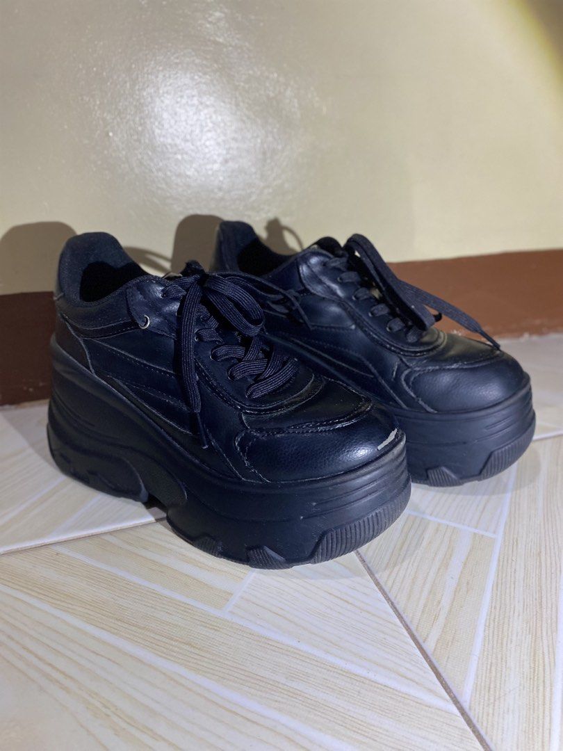 Bershka Black XL Platform Trainers (Category: Sneakers) located in Quezon City. Submitted by jasmineloraine (Listing ID 1459905902, Image 2). Description: • Bought it in Doha, Qatar last 2024. • Original price: 349.00 QAR or ₱6,004.88 in peso (based on Bershka's official website) Issues: Missing diamond (with brand logo) on one shoe, has minor peeling, no box. RFS: Decluttering. .