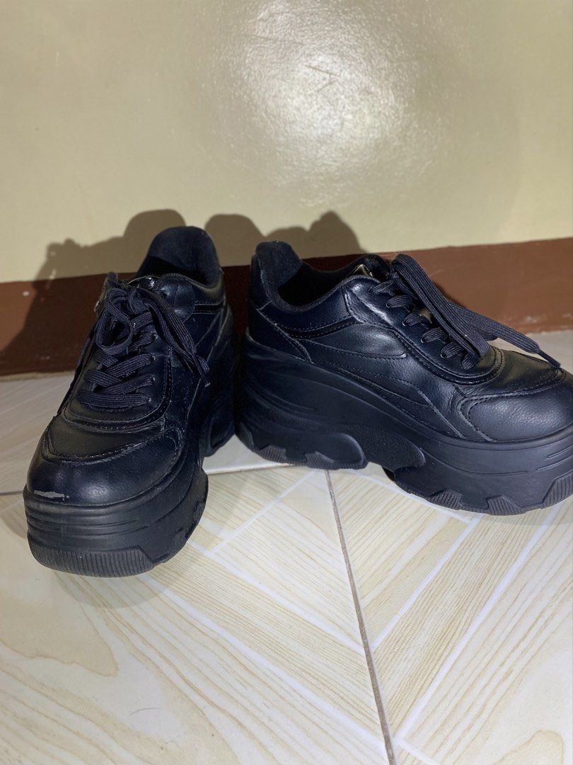 Bershka Black XL Platform Trainers (Category: Sneakers) located in Quezon City. Submitted by jasmineloraine (Listing ID 1459905902, Image 3). Description: • Bought it in Doha, Qatar last 2024. • Original price: 349.00 QAR or ₱6,004.88 in peso (based on Bershka's official website) Issues: Missing diamond (with brand logo) on one shoe, has minor peeling, no box. RFS: Decluttering. .