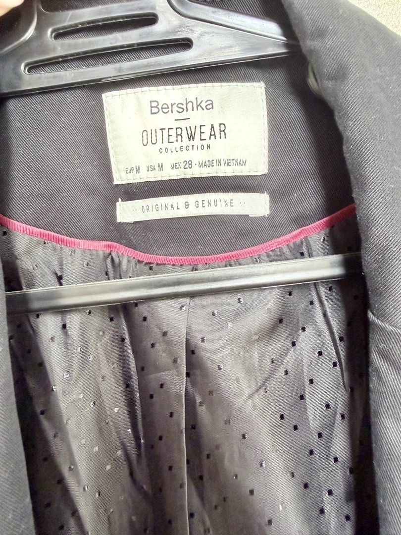 Bershka Outerwear Black Blazer (Category: Coats, Jackets and Outerwear) located in Pasig City. Submitted by lonelydove (Listing ID 1460035431, Image 2). Description: - Classic black blazer from Bershka - Single button closure - Two front pockets - Lined interior with subtle polka dot pattern - Versatile for smart casual or work outfits.