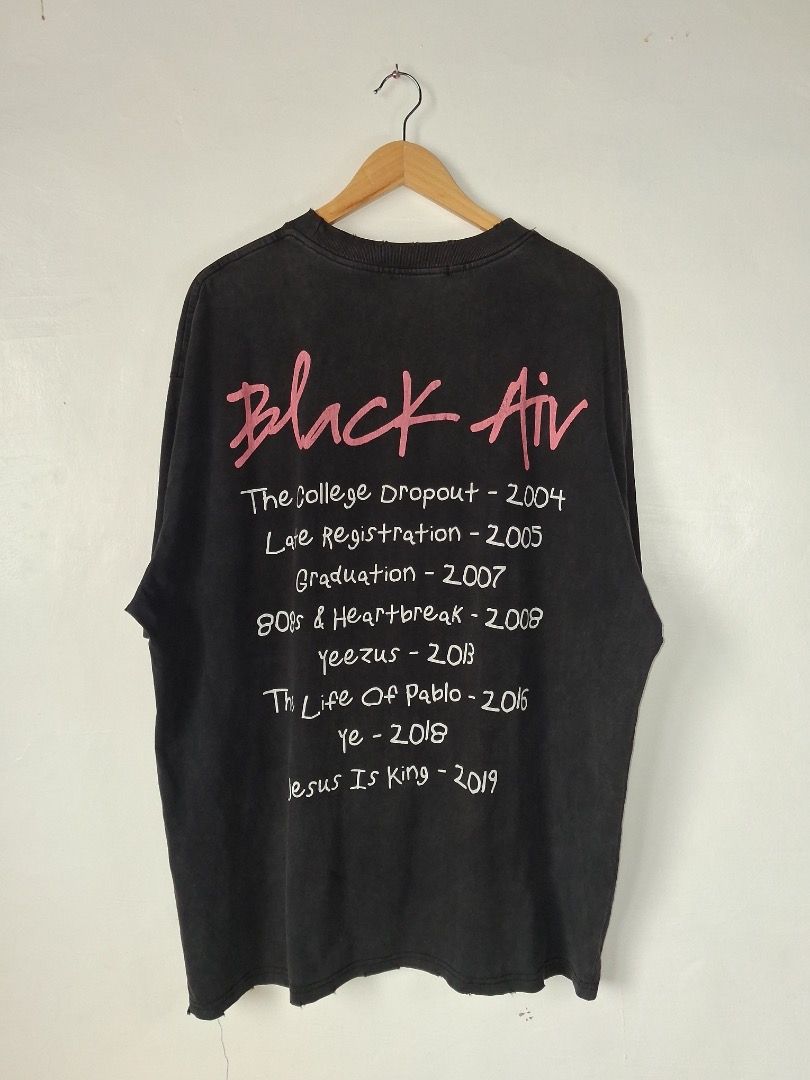 Black Air X Kanye West Black Tee (Category: Tshirts & Polo Shirts ) located in Makati City. Submitted by seller_102 (Listing ID 1459917886, Image 2). Description: Brand: Black Air X Kanye West Dimes: 26in x 32in Issue: None Color Rate: 9/10 Condition: Excellent.