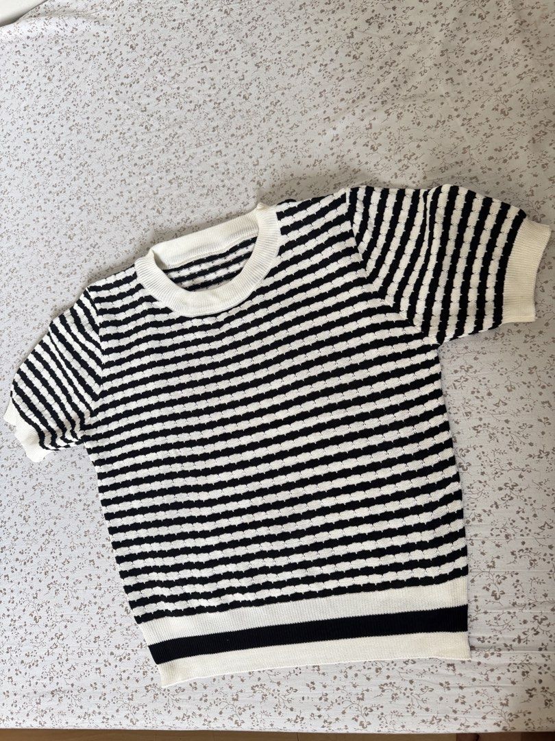Black and White Striped Knit Top (Category: Blouses) located in Marikina City. Submitted by raxyi (Listing ID 1459983607, Image 1). Description: - Black and white striped short sleeve knit top - Features a textured knit detail - Ribbed neckline and hem for a comfortable fit - Stylish and perfect for everyday casual wear.